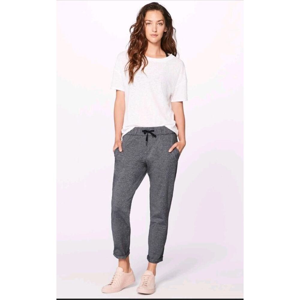 Lululemon Women's On The Fly Luxtreme Heathered Grey Drawstring Pant Size 12 EUC
